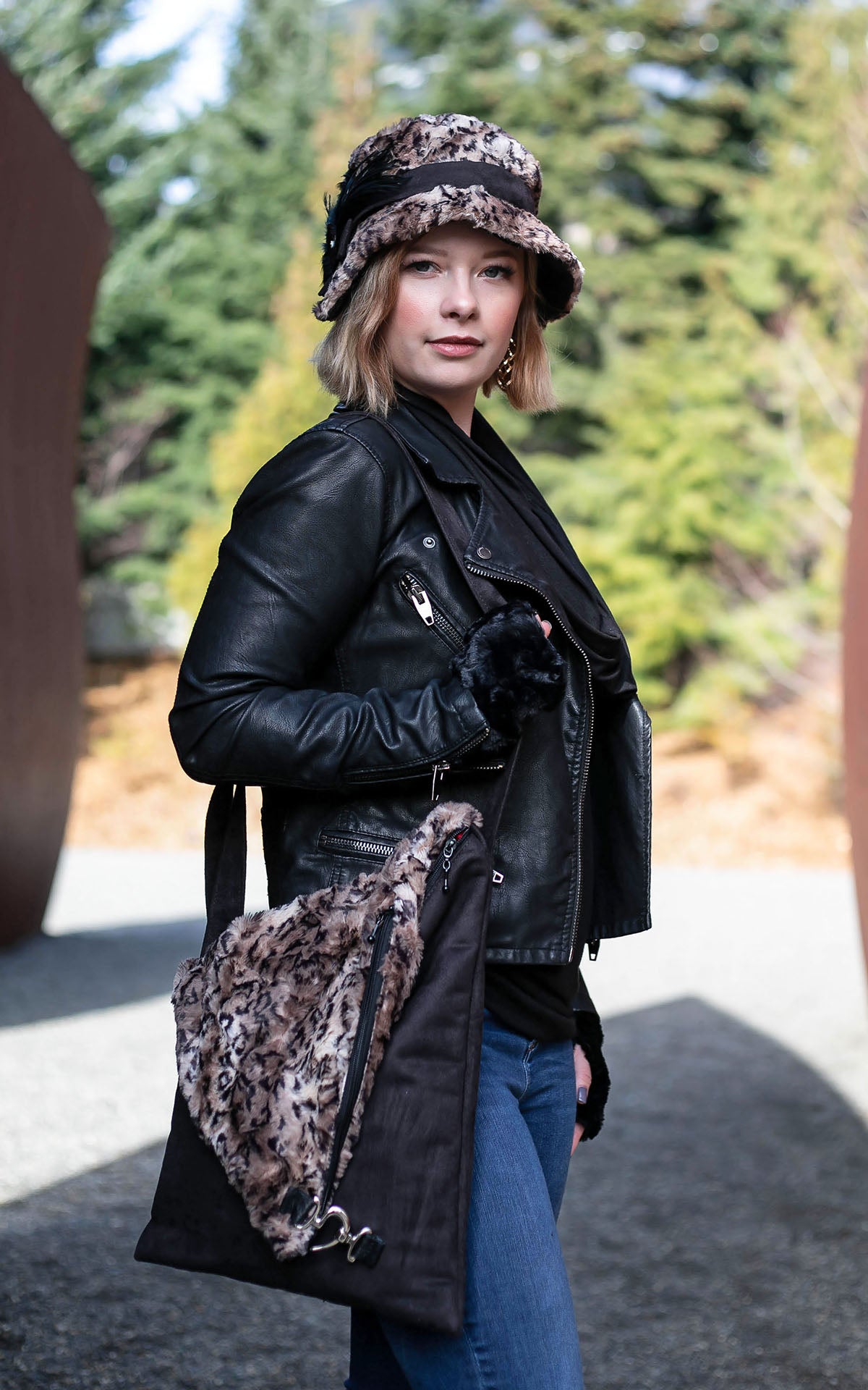 Woman with Cloche Hat and Naples Messenger Bag | Black Suede with Carpathian Lynx Faux Fur Flap | handmade in Seattle WA by Pandemonium Millinery USA