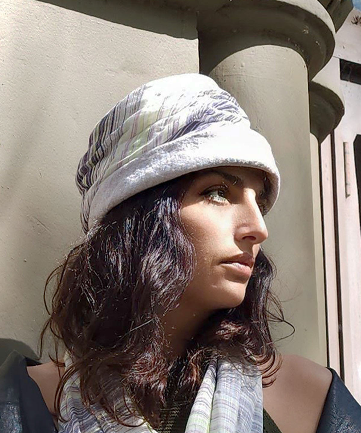 Model Showing Sideview of the Ana Cloche Hat in Bone Linen with Seashell Spring Band| Handmade in Seattle WA| Pandemonium Millinery