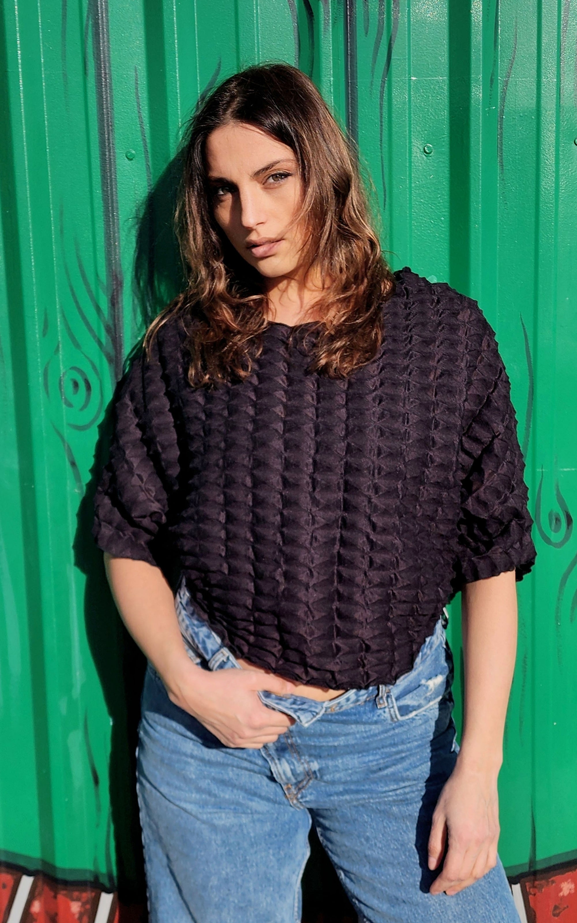 Model photo of the Batwing Top in Black, from the Fractal Collection. LYC and Pandemonium Seattle are handmade in Seattle, WA, USA.
