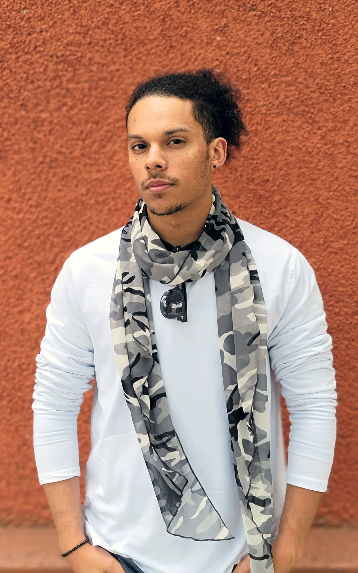 Man modeling Handkerchief Scarf in Black Ops camoflauge chiffon scarf in black, gray , and ivory with sunglasses