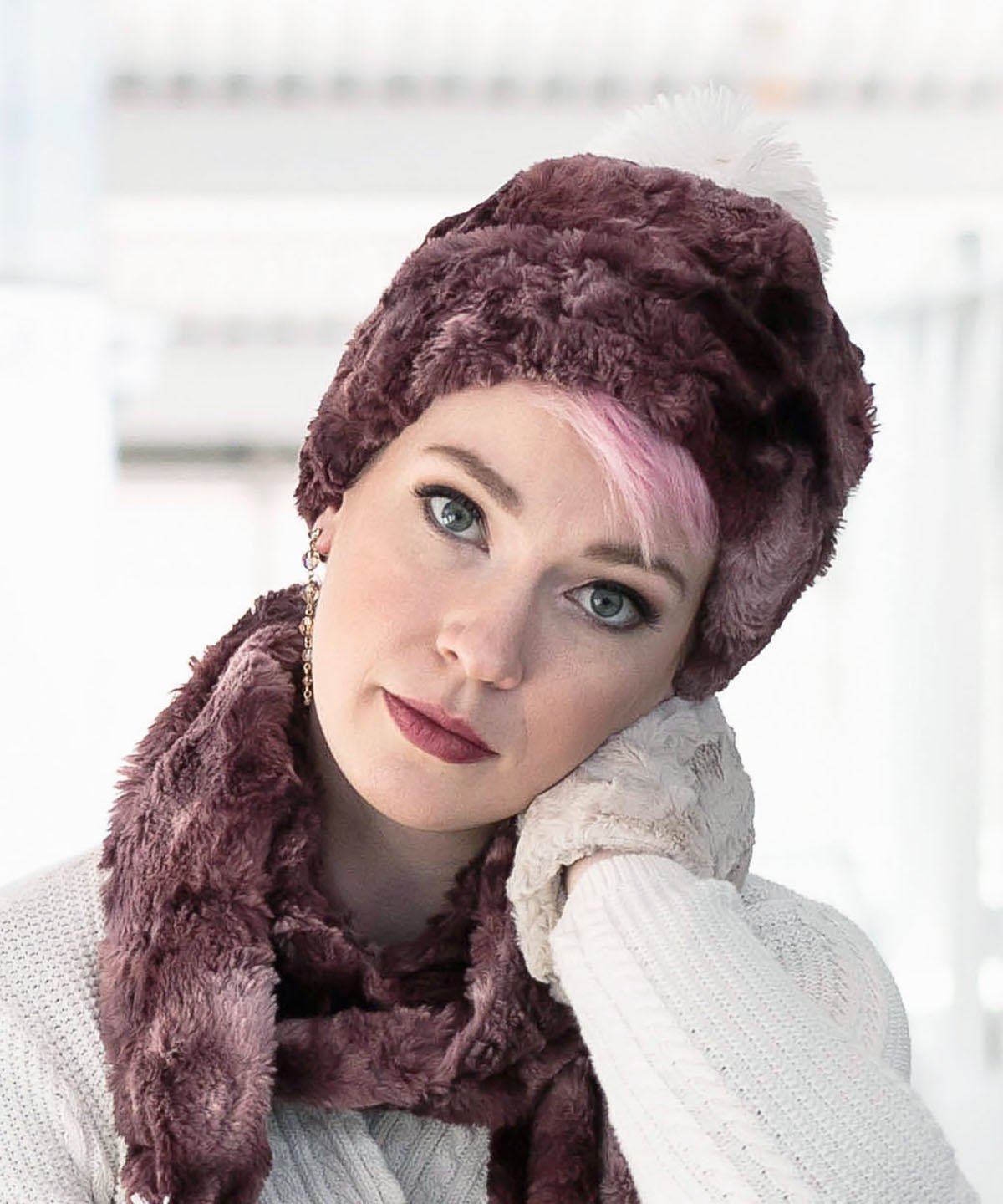 Woman modeling Beanie Hat, reversible in Luxury Faux Fur - Highland Thistle with matching gloves. Pandemonium Millinery in Seattle, WA.