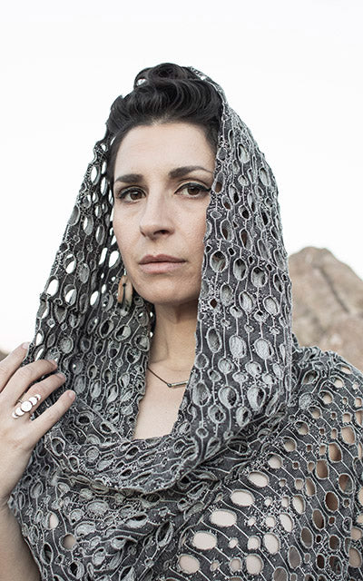 Close up of model is wearing the Badlands Cloak with hood up in Lunar Landing. By Leigh Young Collection handmade in Seattle WA