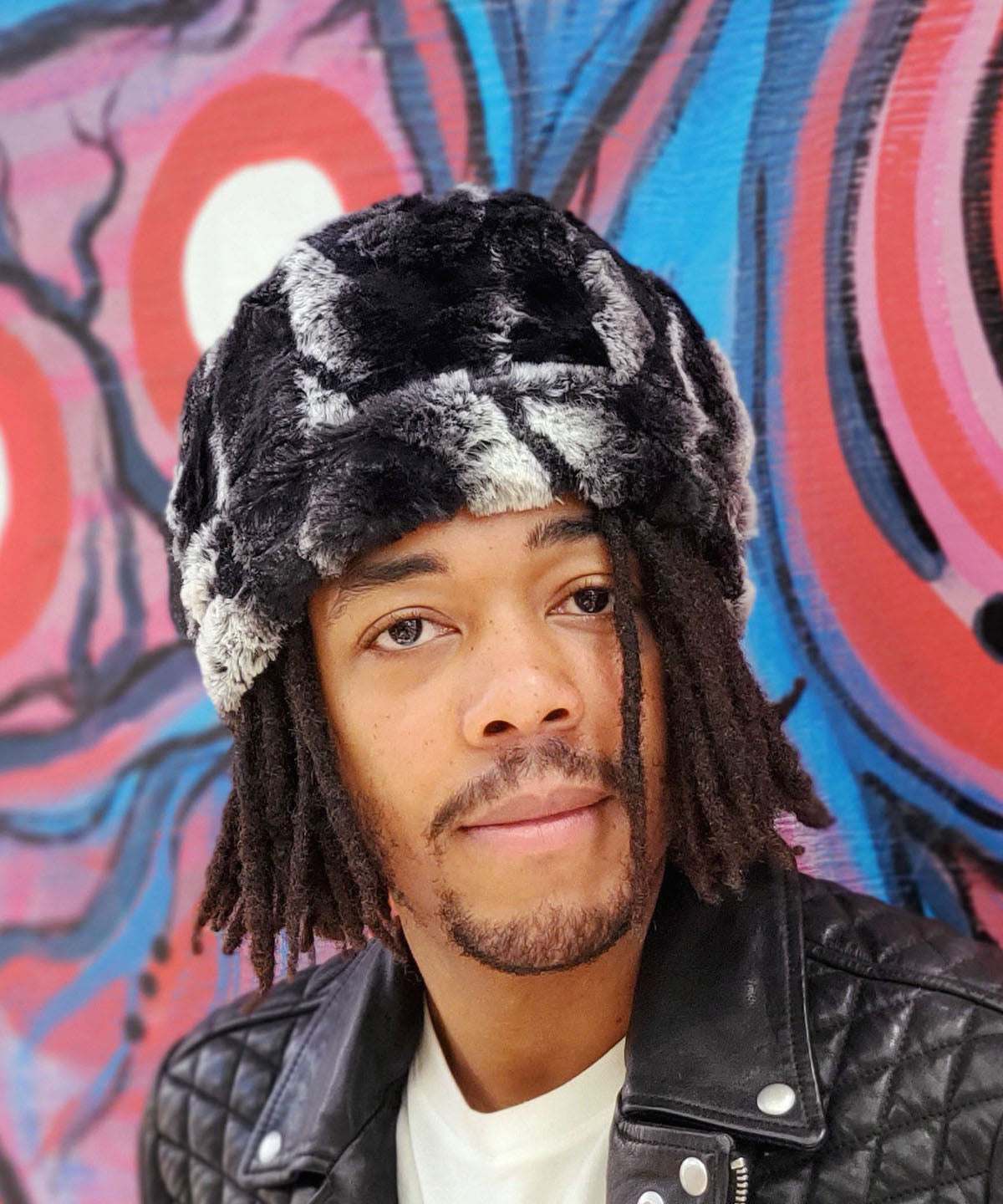 Model shown in Men&#39;s Beanie Hat, Reversible | Honey Badger, Black and Cream Faux Fur | Handmade in the USA by Pandemonium Seattle