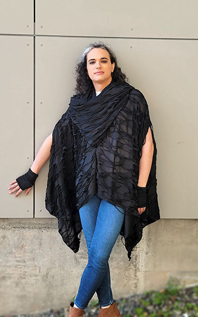 Model is wearing the Badlands Cloak in Black Hole Celestial Trellis by Leigh Young Collection handmade in Seattle WA