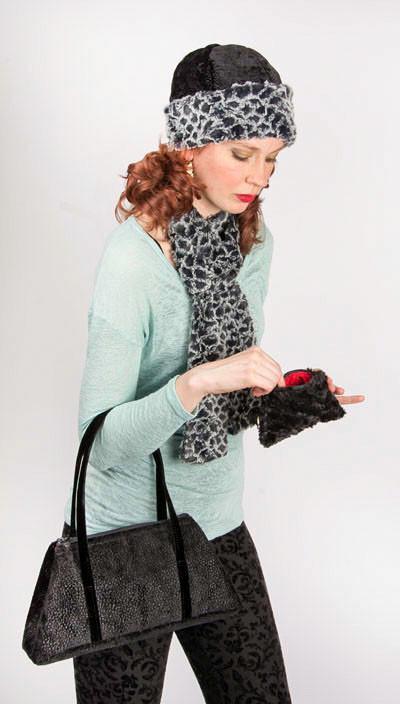 Woman looking into a Coin Purse in Black Faux Fur handmade in Seattle WA USA by Pandemonium Millinery