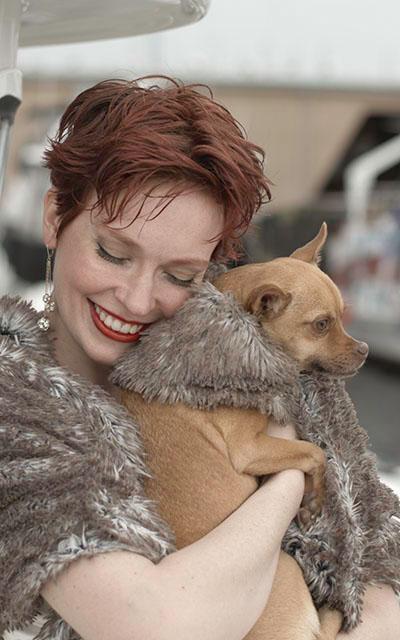 Girl wearing matching stole holding Chihuahua dog wearing Designer Handmade Dog ruff collar| Red Fox Faux Fur | Handmade by Pandemonium Millinery Seattle, WA USA