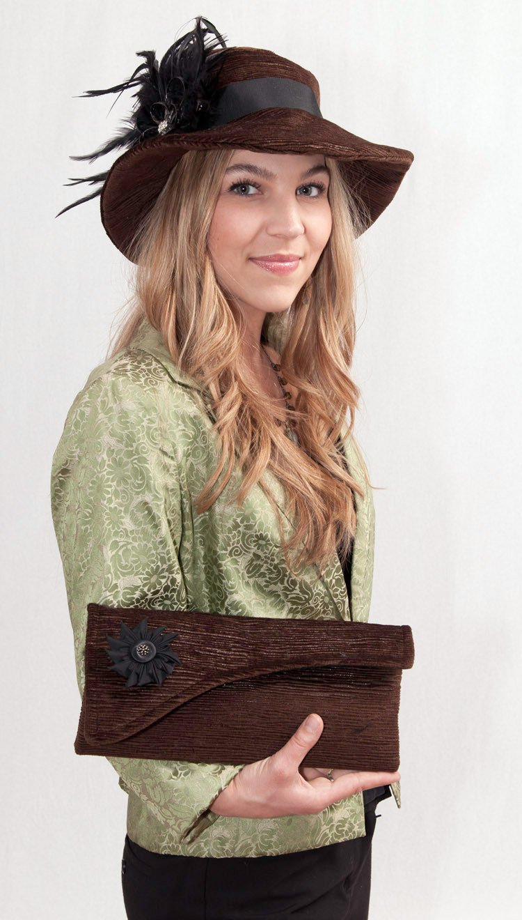 woman holding Envelope Clutch with matching hat - Cohen in Brown Upholstery Fabric Handbag Pandemonium Millinery