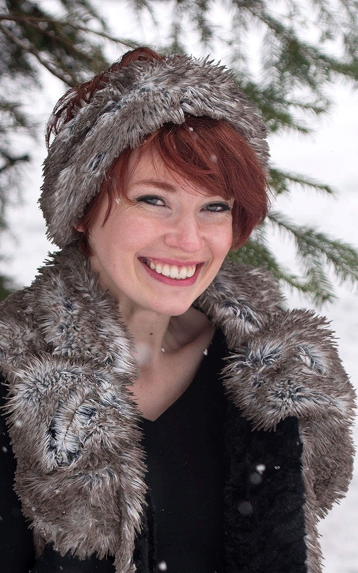 Model in snow wearing  Headband, Fingerless Gloves and Vest | Arctic Fox Gray and Cream Faux Fur | Handmade by Pandemonium Millinery Seattle, WA USA