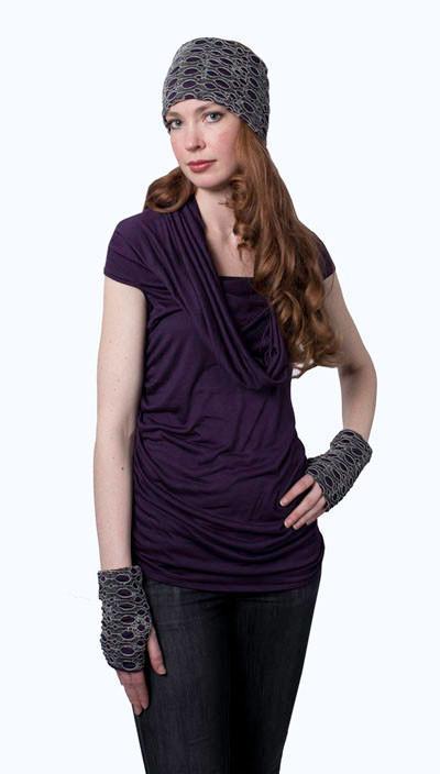 Model wearing the fingerless gloves and headband with a coordinating Hooded Cowl Top a This top can be worn as a cowl neck, off-shoulder, or hooded style. | Purple haze a lightweight jersey knit in black | Handmade in Seattle WA | Pandemonium Millinery