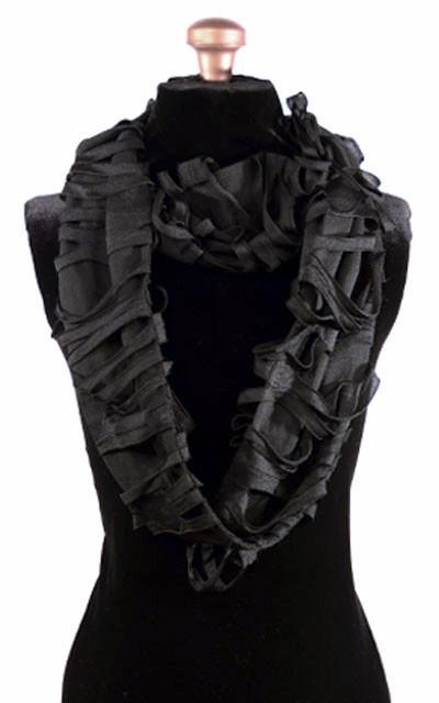 Infinity loop Scarf in Black Hole on mannequin | tie-dye knit with a top layer of embossing and tendrils in black | handmade in Seattle, WA USA by Pandemonium Millinery