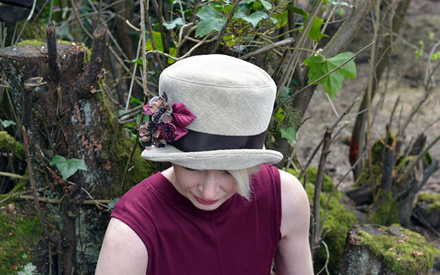 Women&#39;s Riley Cloche Hat in Evolution in Putty with Flower Brooch Top View Wide | Handmade in Seattle WA | Pandemonium Millinery