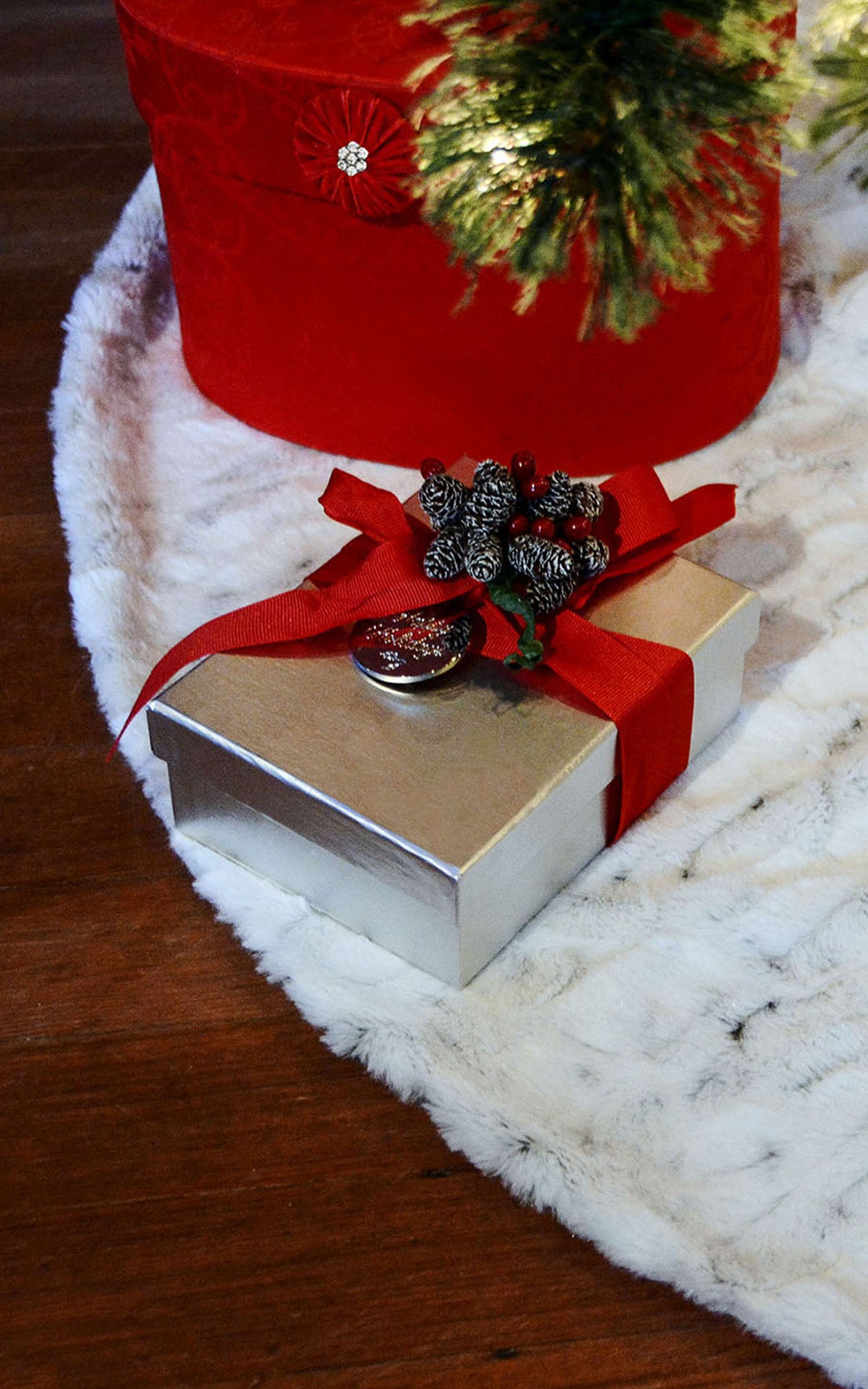 Tree skirt in winter frost faux fur with gifts by Pandemonium Millinery made in the USA