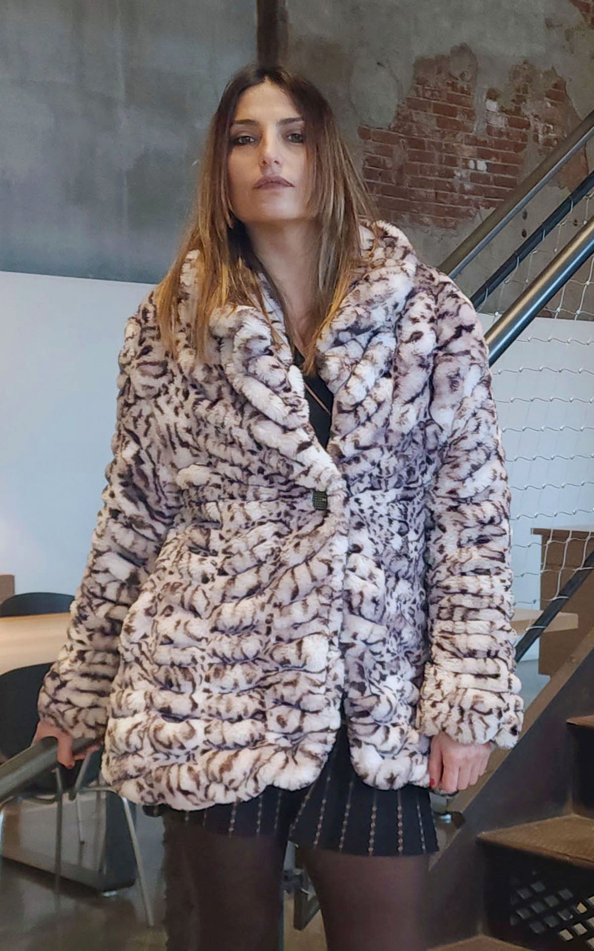 model wearing a Faux Fur Coat leoprd coat | Handmade by Pandemonium Millinery
