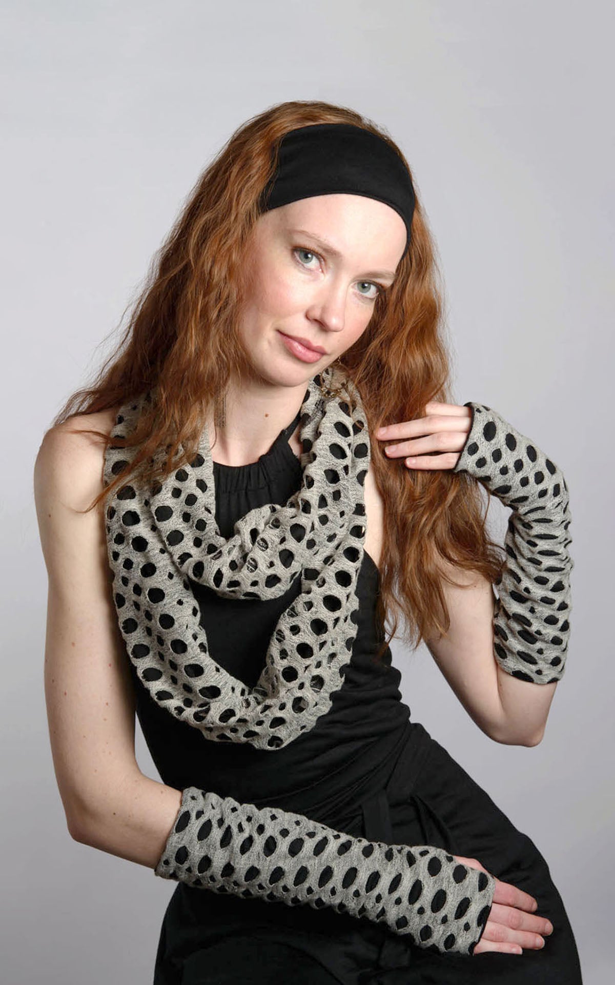 Model wearing Lunar Landing scarf and glove set