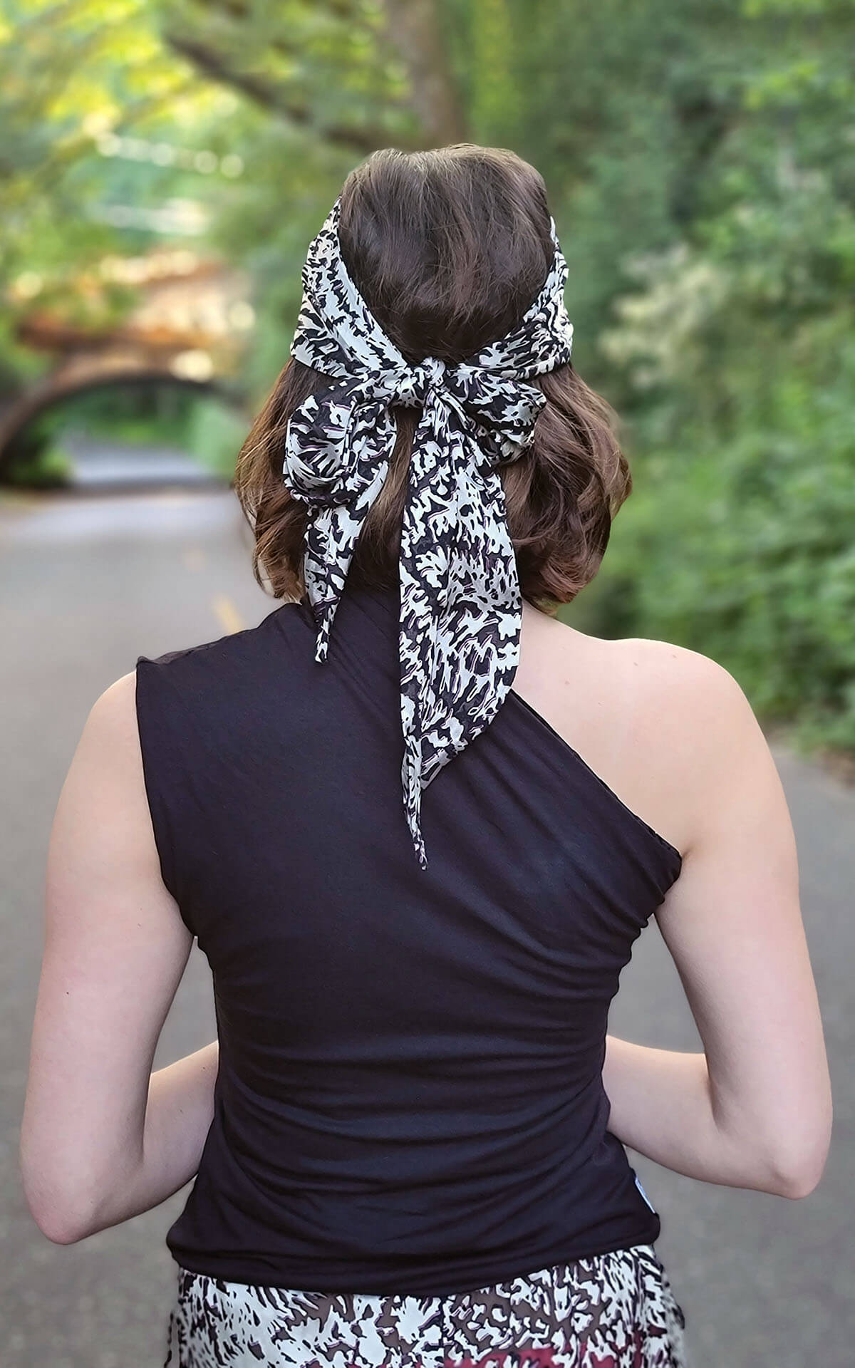 Model with Back Turned wearing Hair Tie in Coral Garden