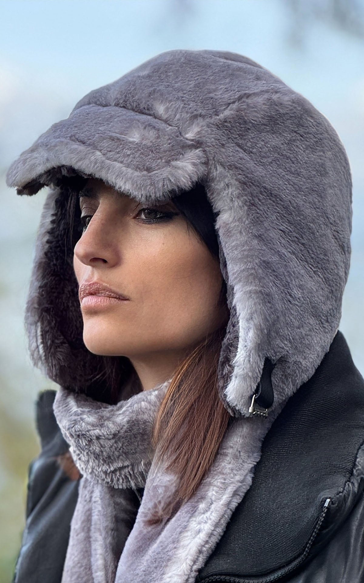 Aviator Hat or Trapper Hat in Coastal Plush Olympic Fog Faux Fur with reverse side Cuddly Smoky Faux Fur. shown with the brim turned down and side profile. Made in Seattle, WA, USA by Pandemonium Seattle.