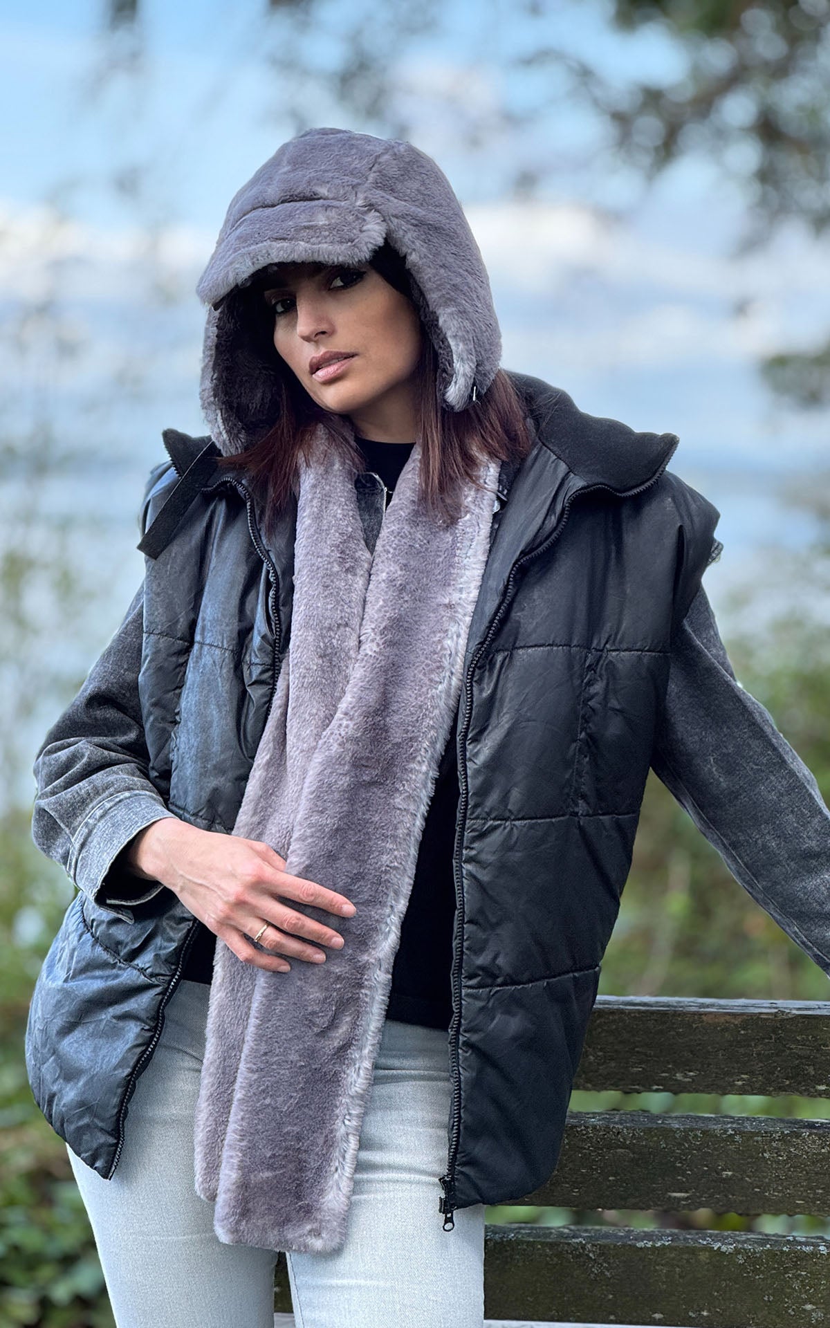 A woman standing wearing a Skinny scarf in Olympic Fog with matching Aviator Hat. Handmade in Seattle, WA , USA by Pandemonium Millinery