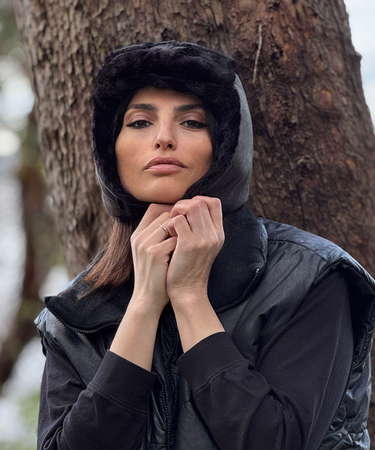 Front view of a woman wearing the Aviator Hat in Vegan Leather Rustic in Olive  with Cuddly Faux Fur in Black. Handmade in Seattle, WA , USA by Pandemonium Millinery