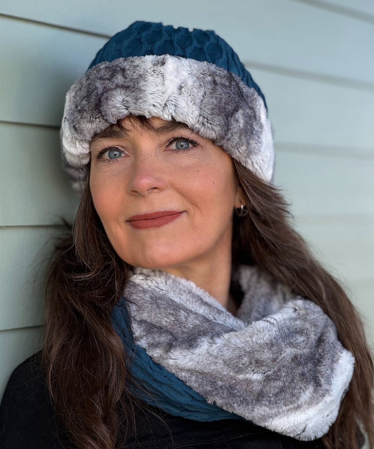 Woman wearing Fractal in Cerulean  Blue Beanie Hat with Smoke Show Faux Fur with matching Two-Tone Infinity Scarf. Handmade by Pandemonium Seattle, USA