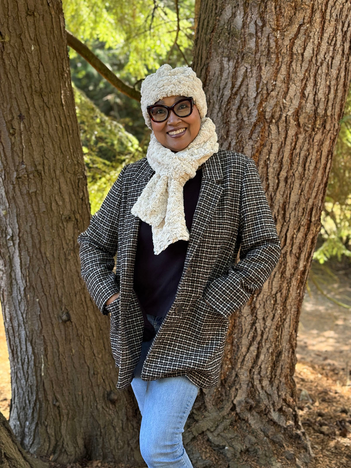 Woman wearing the Classic Scarf in Rosebud Brown with the matching Beanie Hat in Rosebud Brown. Made in Seattle, WA, USA by Pandemonium Millinery.