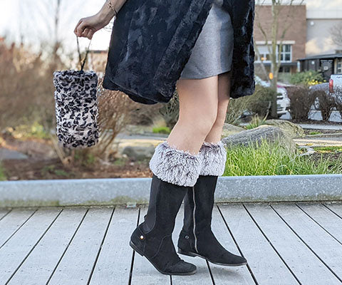 Woman holding Muff in Savannah Cat Faux Fur Reversible | Handmade in Seattle WA | Pandemonium Millinery