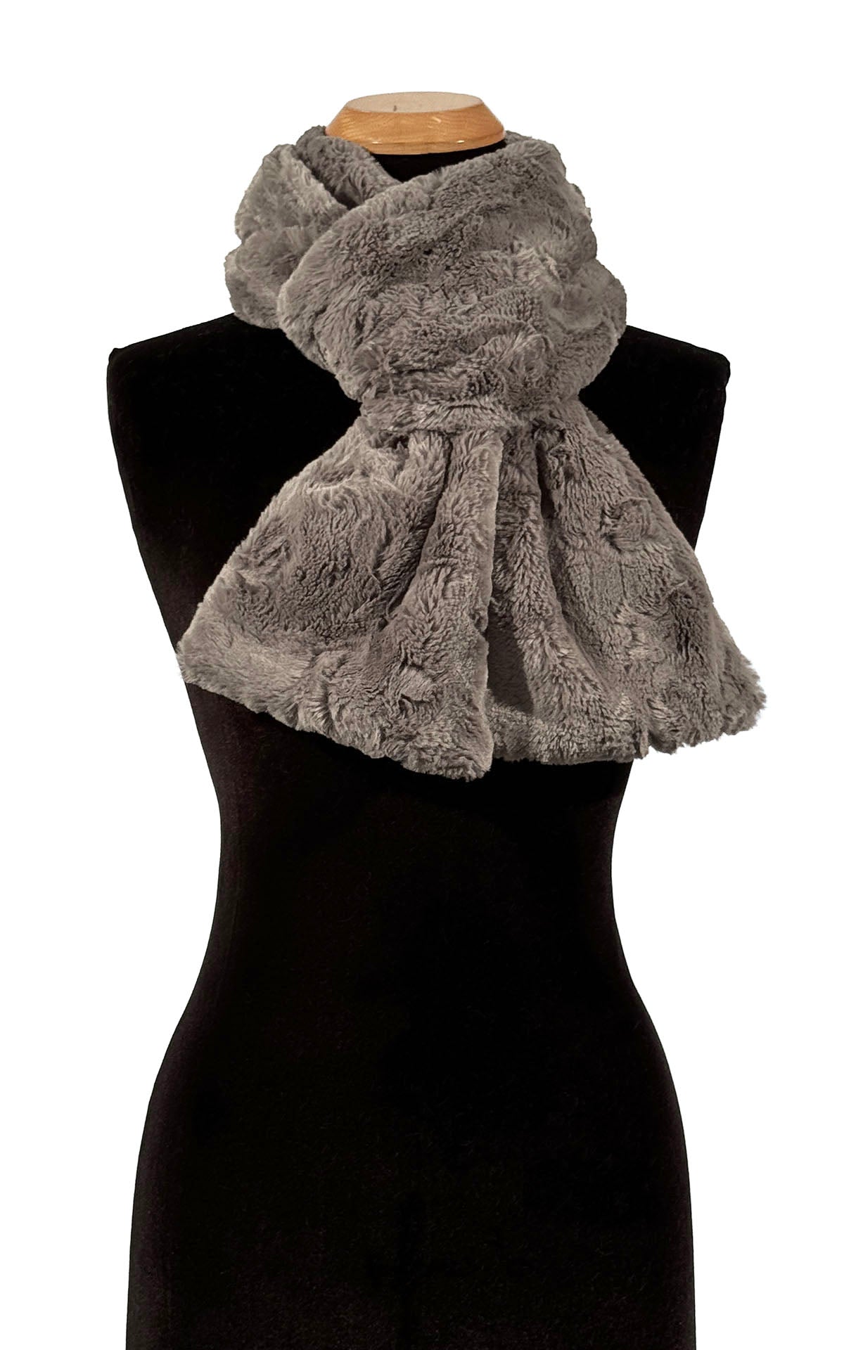 Classic Skinny Scarf in Cuddly Taupey Faux Fur is gently wrapped around the mannequin. Made in Seattle, WA, USA by Pandemonium Seattle.