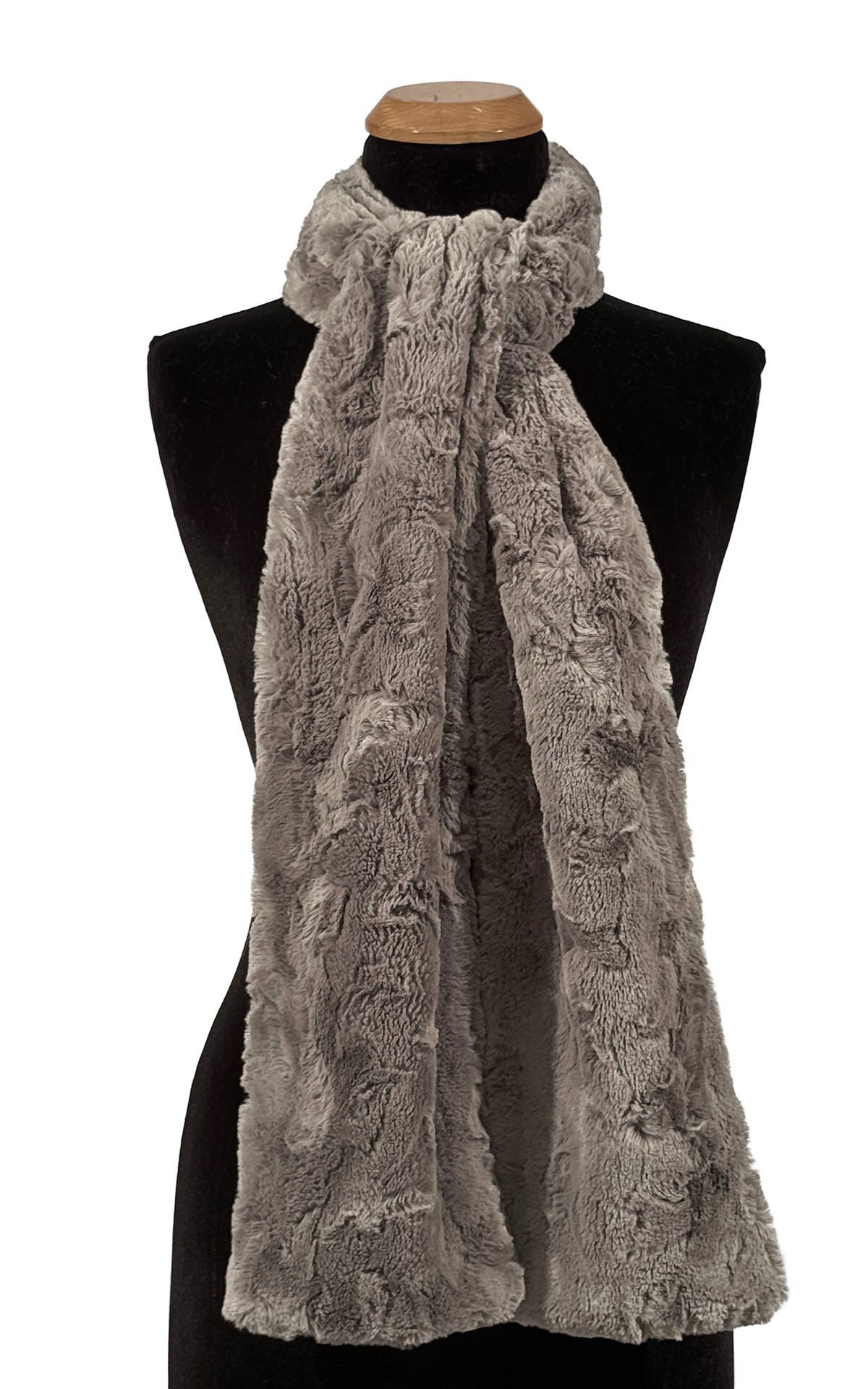 Classic Scarf in Cuddly Taupey Faux Fur is gently tied around the neck of the mannequin. Made in Seattle, WA, USA by Pandemonium Seattle.