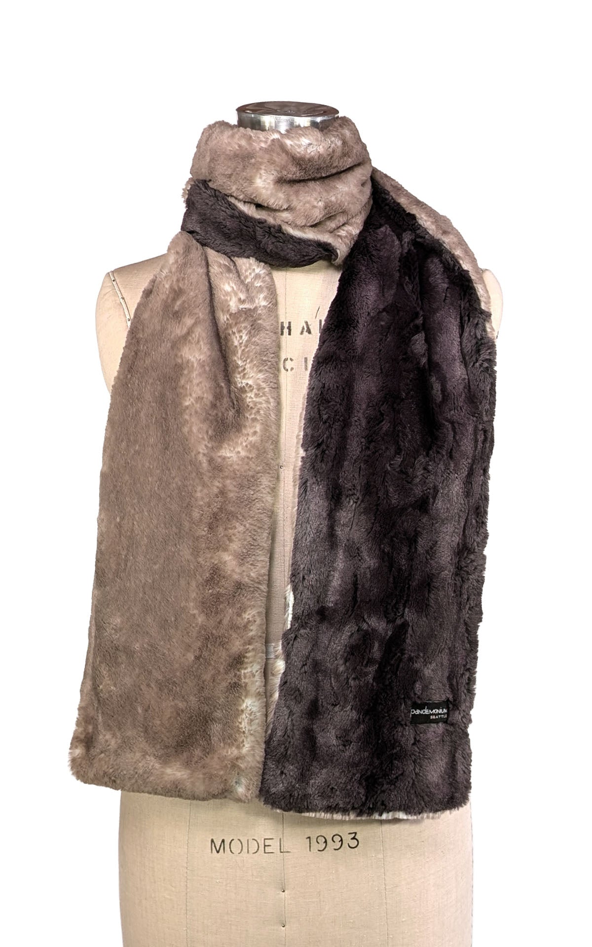 Two-Tone Scarf, Cuddly Faux Fur Taupey and Cuddly Black, draped over a mannequin. Scarf is handmade in Seattle WA by Pandemonium