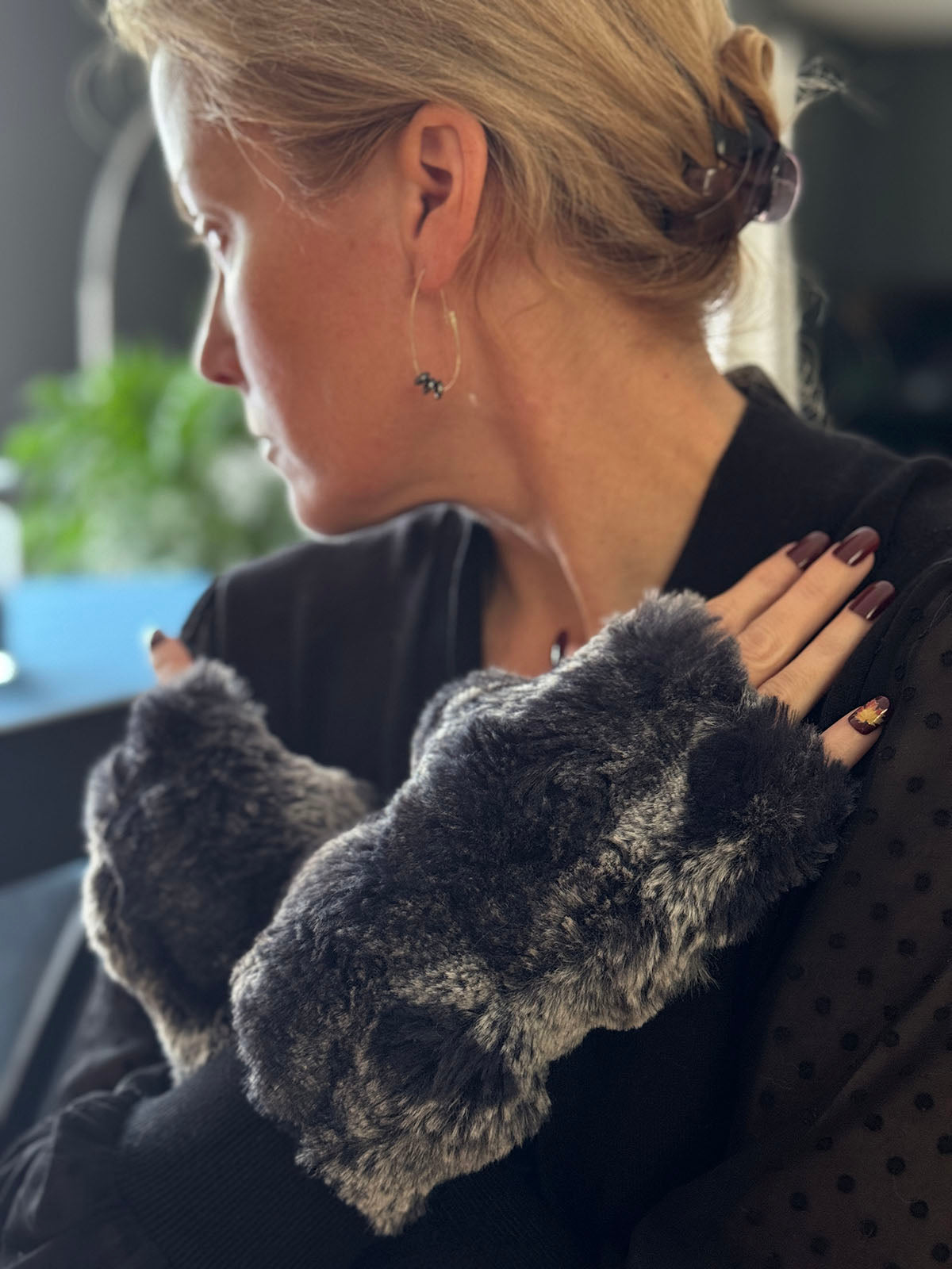 Woman wearing Cloudwalk Shadow Fingerless Gloves. Made in Seattle, WA, USA by Pandemonium Seattle.