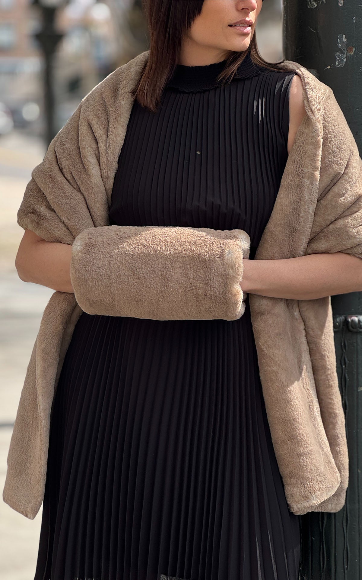 Woman wearing the Muff in Coastal Plush Golden Bluff with the matching Stole in Golden Bluff. Made in Seattle, WA, USA by Pandemonium Seattle.