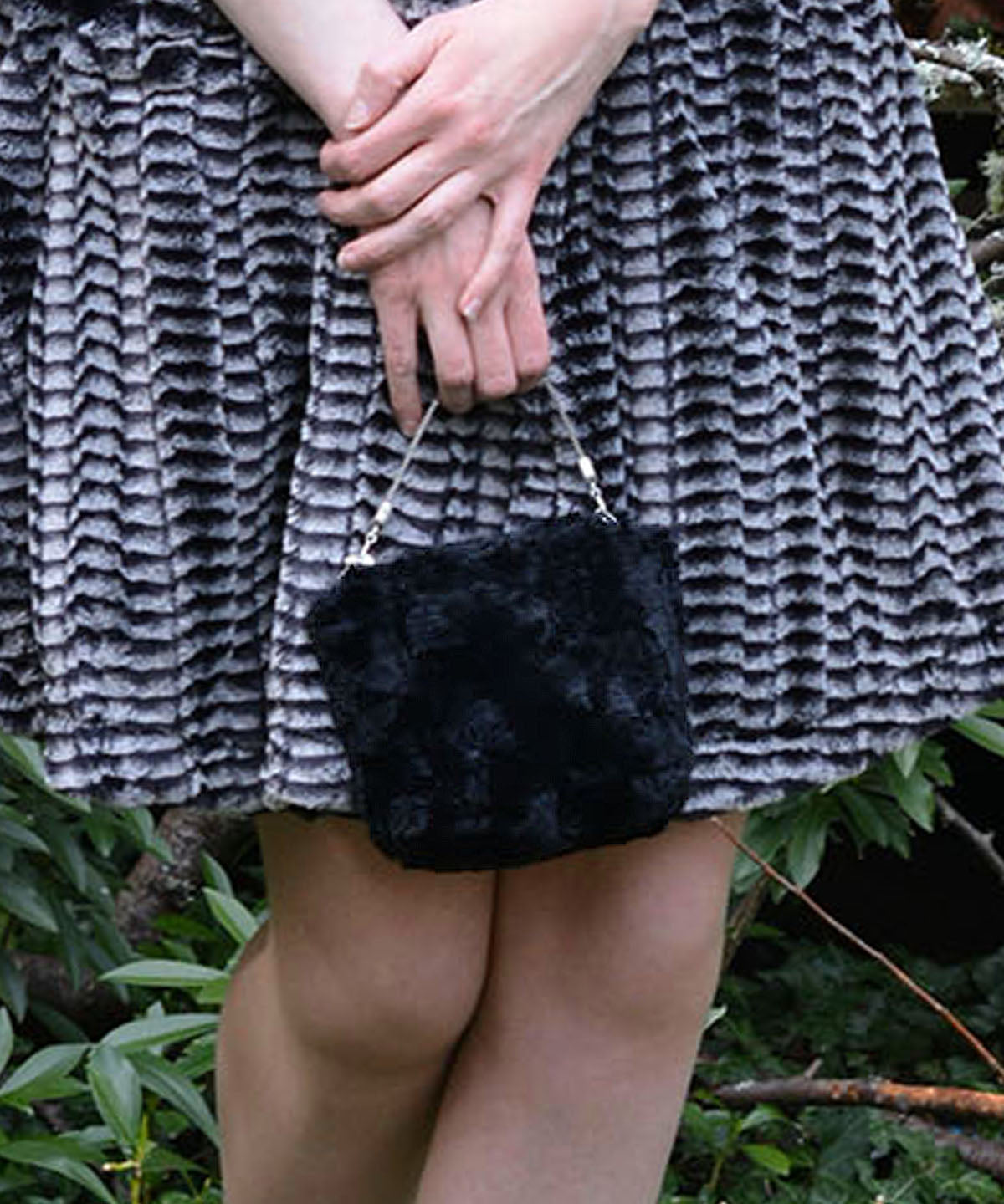 Woman Holding Ibiza Reticule Bag | Cuddy Black Faux Fur | Handmade by Pandemonium Seattle USA