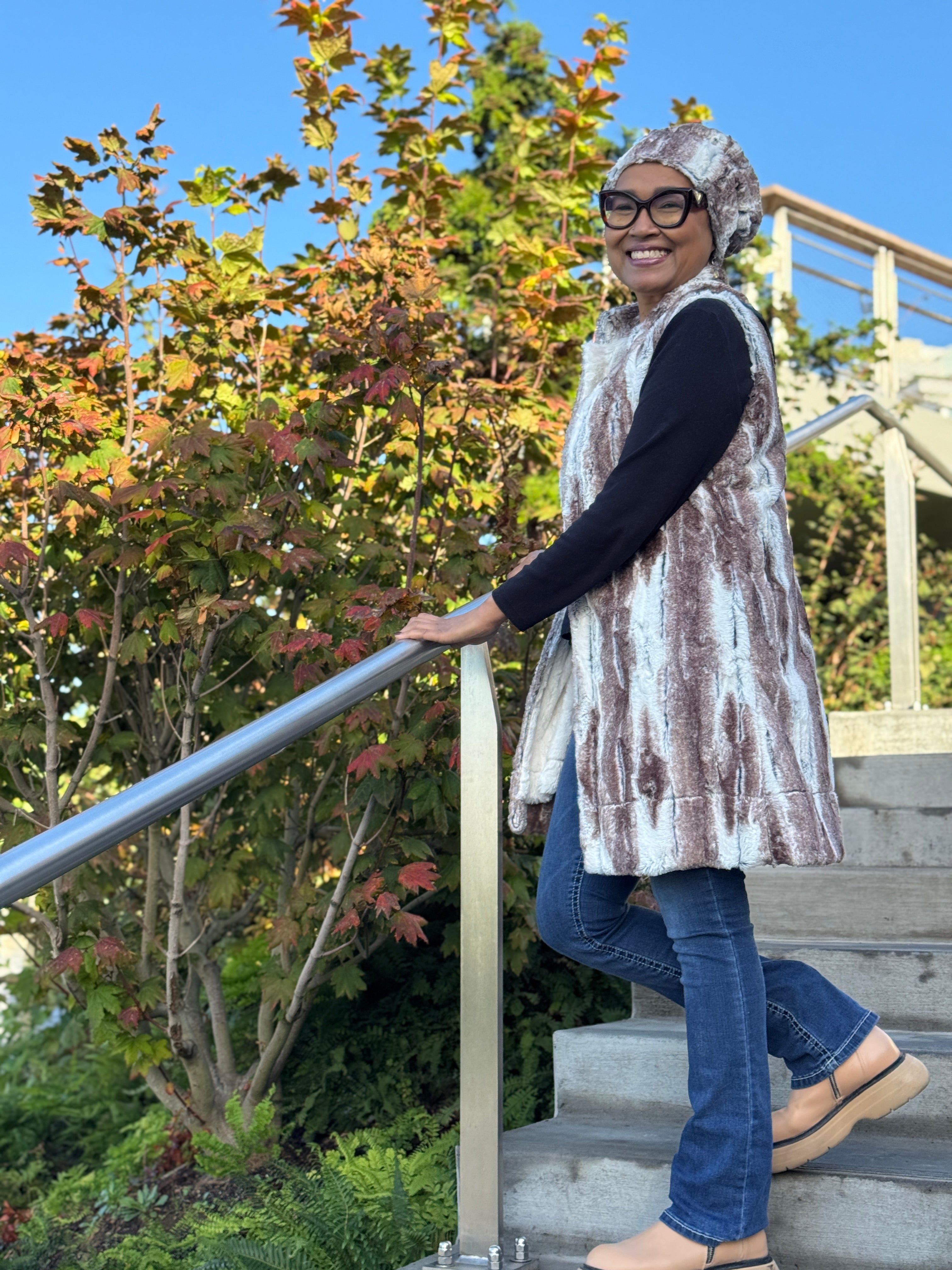 Woman wearing the Birch Cuffed Pillbox with matching Mandarin Vest in Birch and Ivory. Handmade in Seattle, WA, USA by Pandemonium Millinery.