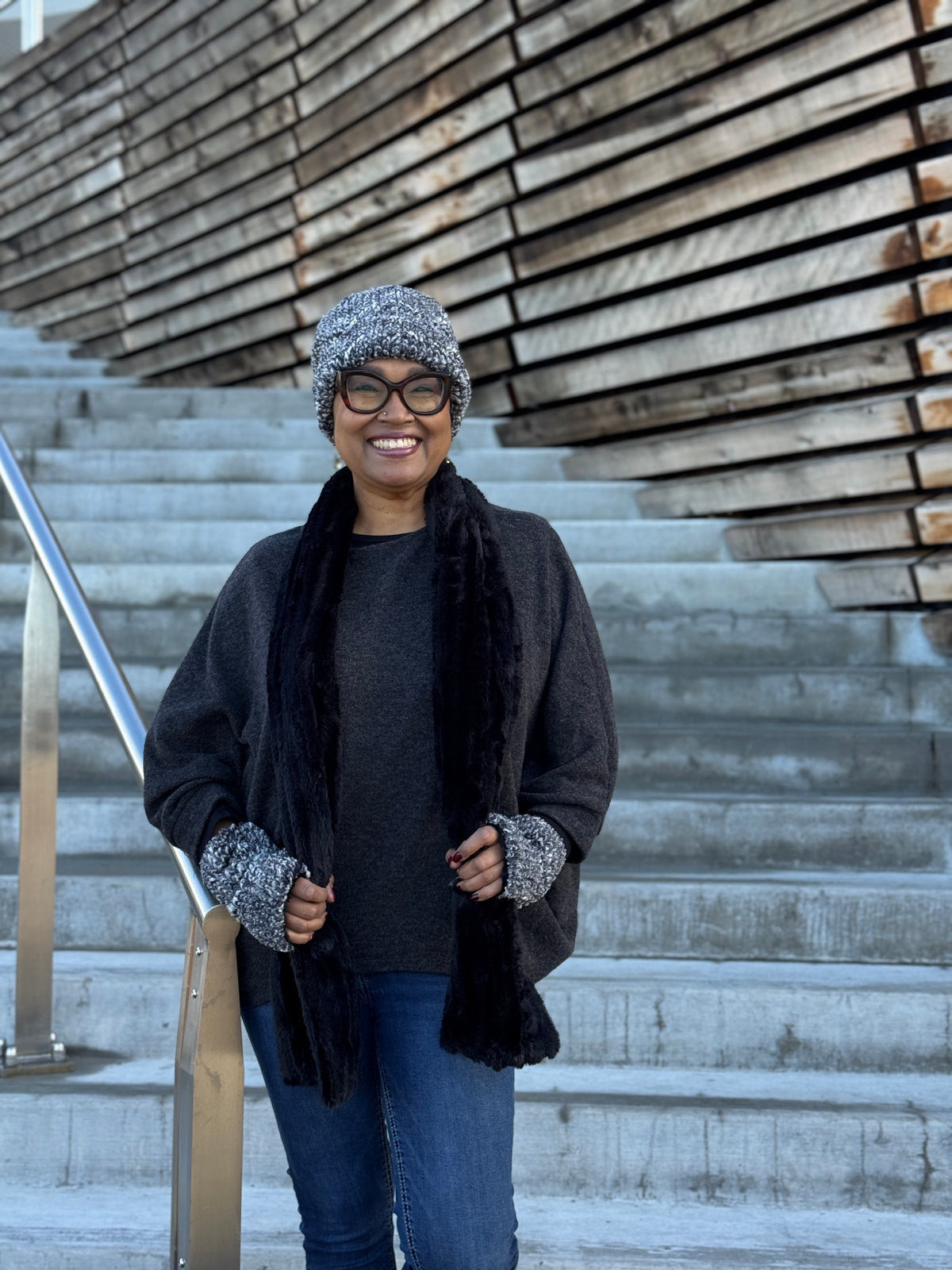 Woman wearing the Classic Scarf in Cirrus Shadow with a Cuffed Pillbox in Cozy Cable and matching Fingerless Gloves. Handmade in Seattle, WA, USA by Pandemonium Millinery.