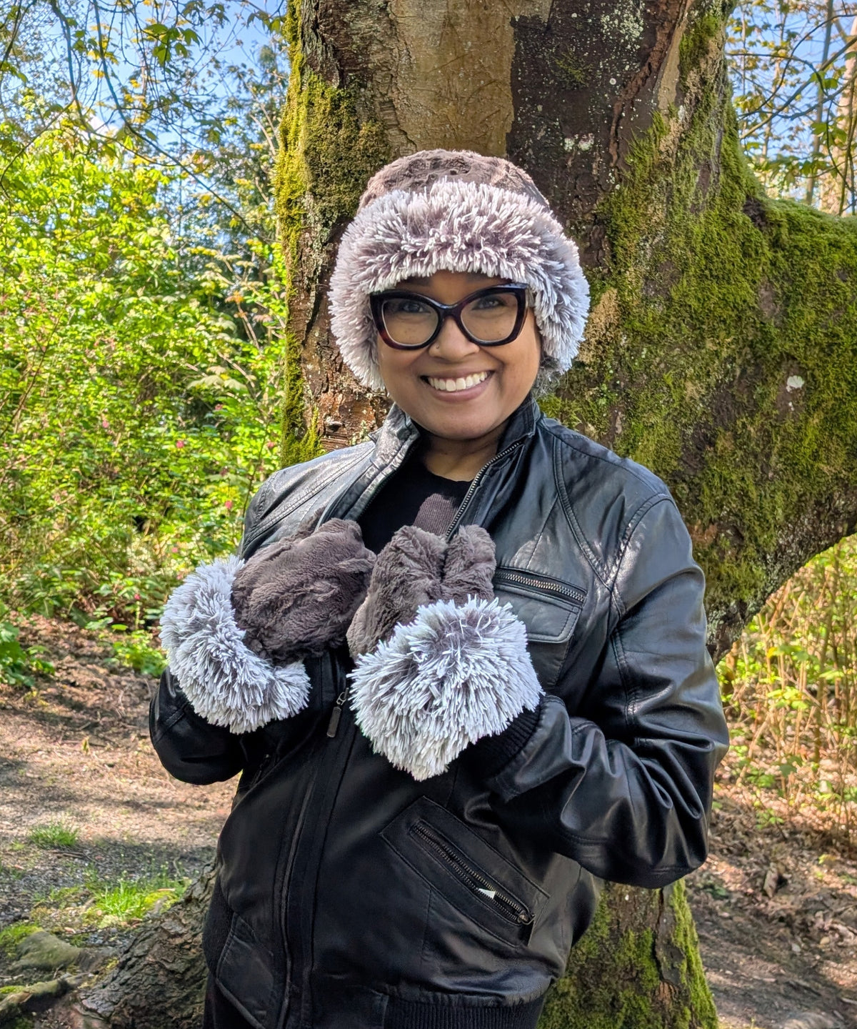 Model wearing Mittens in Pearl Fox Cuffs and Cuddly Faux Fur Hands with matching Beanie Hat. Handmade by Pandemonium Millinery Seattle, WA USA
