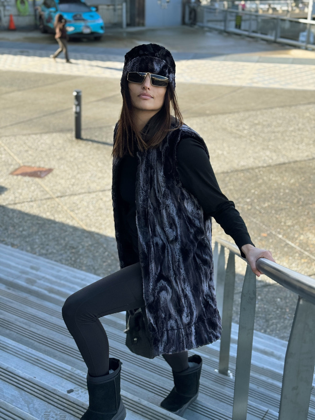 Woman wearing the Mandarin Vest in Black Marble with Cuddly Black and a matching Cuffed Pillbox in Black Marble and Cuddly Black. Handmade in Seattle, WA, USA by Pandemonium Millinery.