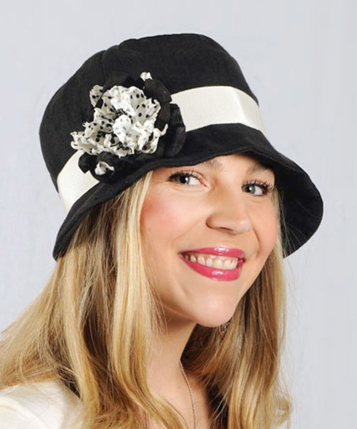 Model wearing Grace Cloche 1920s Style Hat Linen in Black with Black and Gold Kimono Flower Brooch | Seattle WA USA