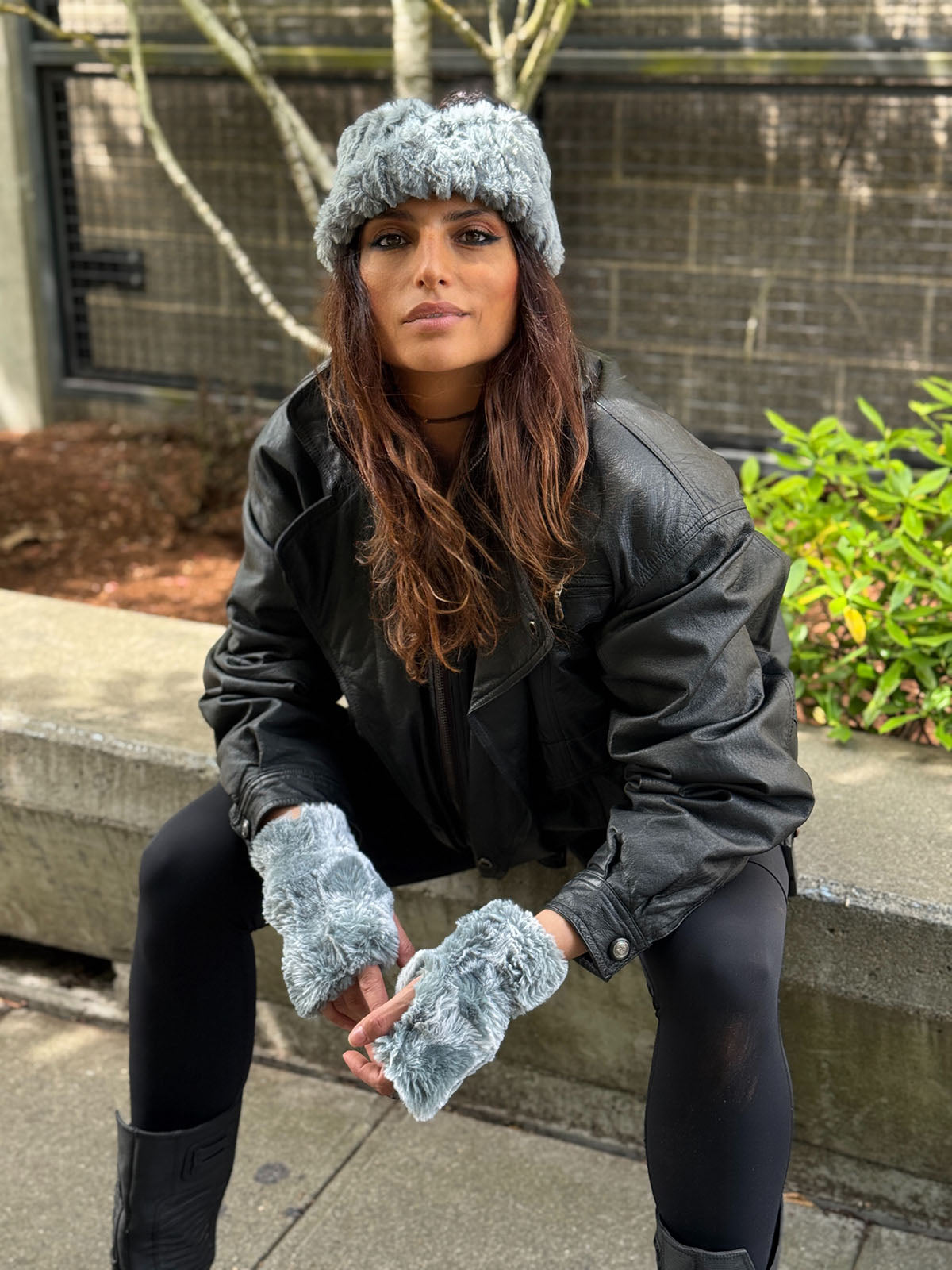 Woman wearing both the Cirrus in Blue Mist Headband and Cloudwalk in Blue Mist Fingerless Gloves. Hand sewn in Seattle, WA by Pandemonium Seattle.