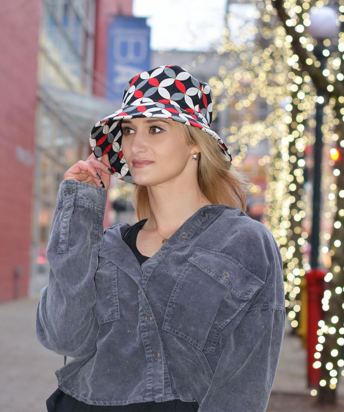 Model is wearing Hollie Sun Hat in Sacred Shantung.  Handmade in USA by Pandemonium Seattle.