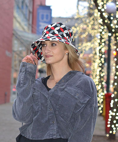 Model is wearing Hollie Sun Hat in Sacred Shantung.  Handmade in USA by Pandemonium Seattle.