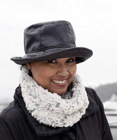 Hollie Rain Hat on model | Powder Puff Silver Vinyl | Handmade Seattle, WA USA by Pandemonium Millinery