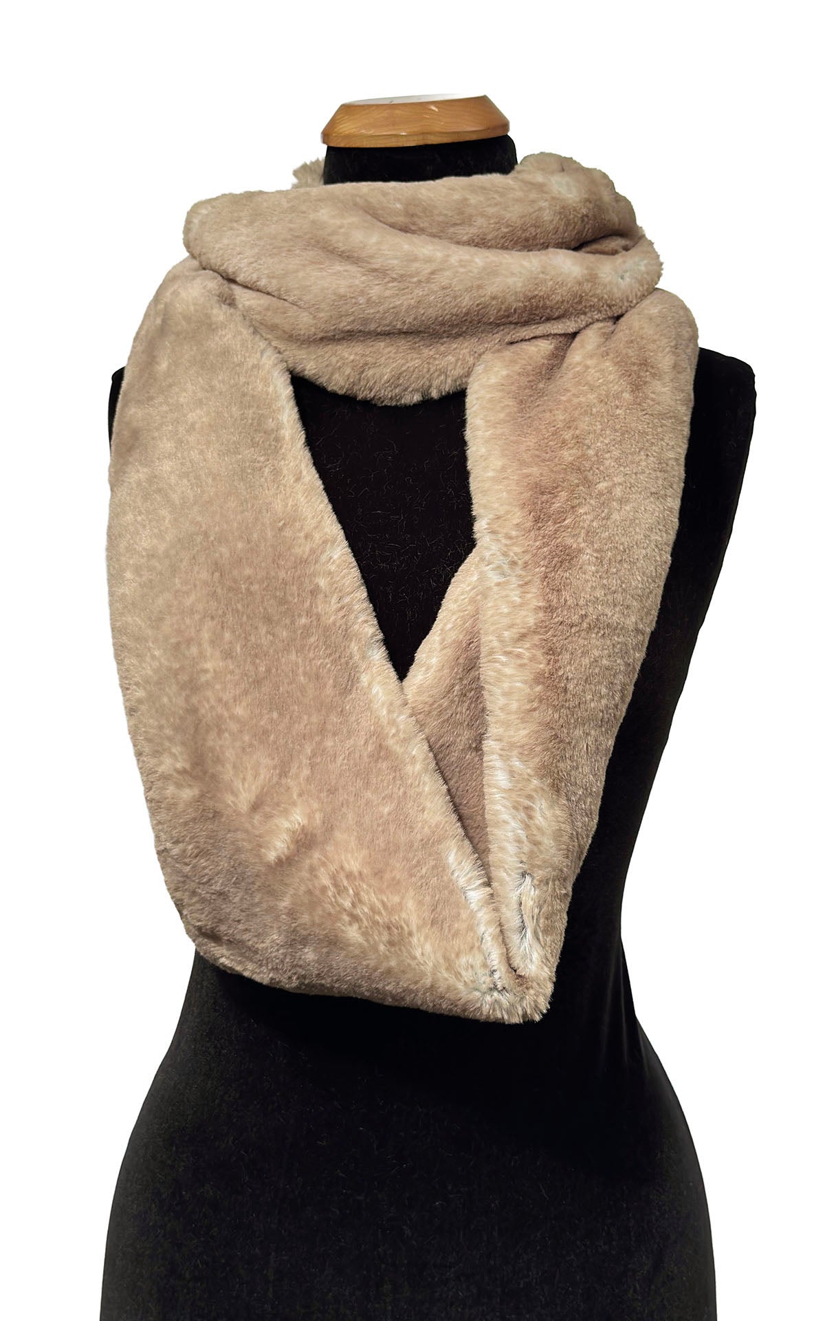 Infinity Scarf in Luxury Coastal Plush Faux Fur in Golden Bluff. Infinity Scarf shown draped with loop close to neck and remaining loop draped across body of mannequin. Made in Seattle, WA, USA by Pandemonium Seattle.