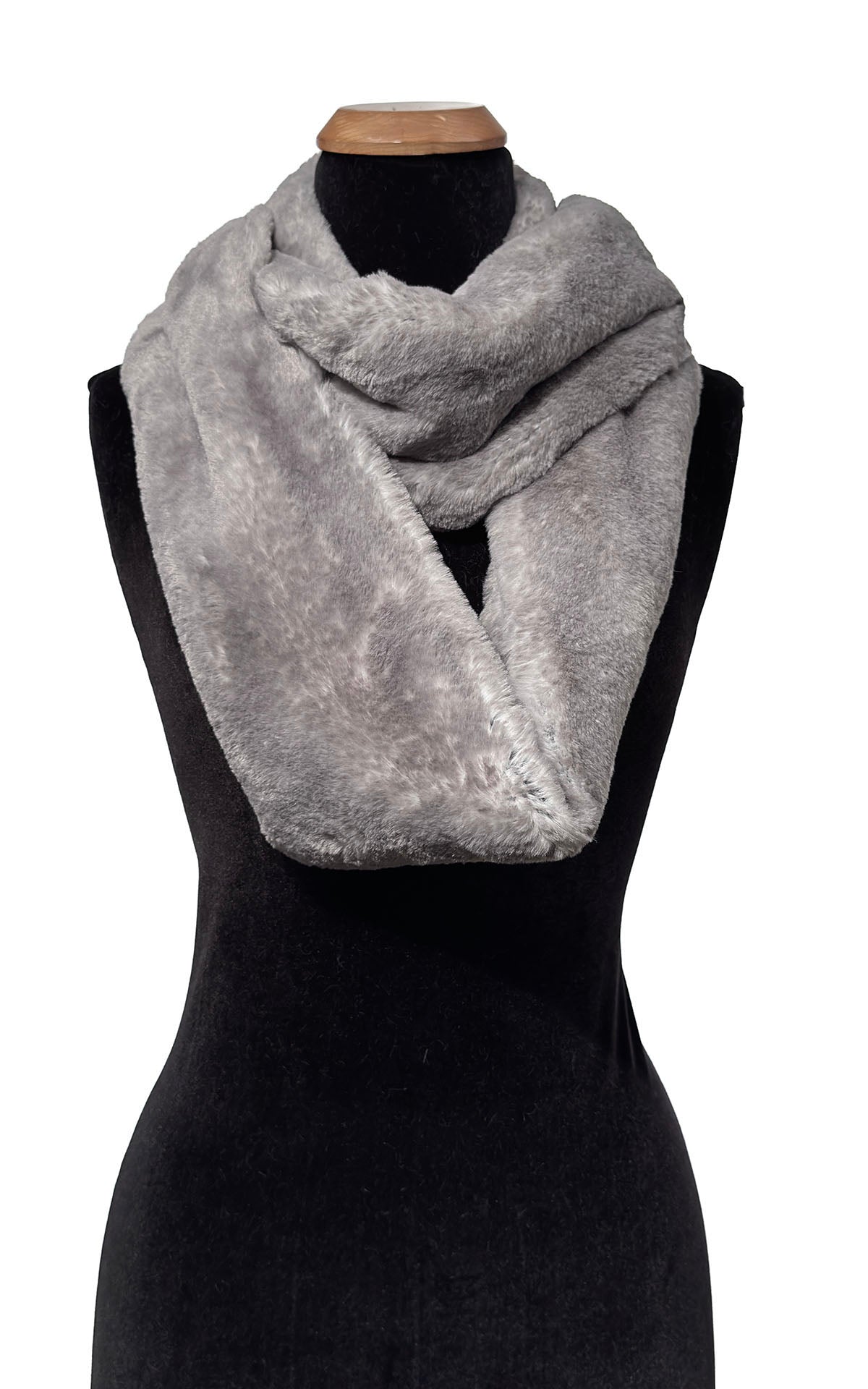 Infinity Scarf in Luxury Coastal Plush Faux Fur in Golden Bluff. Infinity Scarf shown draped with loop close to neck and remaining loop draped across body of mannequin. Made in Seattle, WA, USA by Pandemonium Seattle.