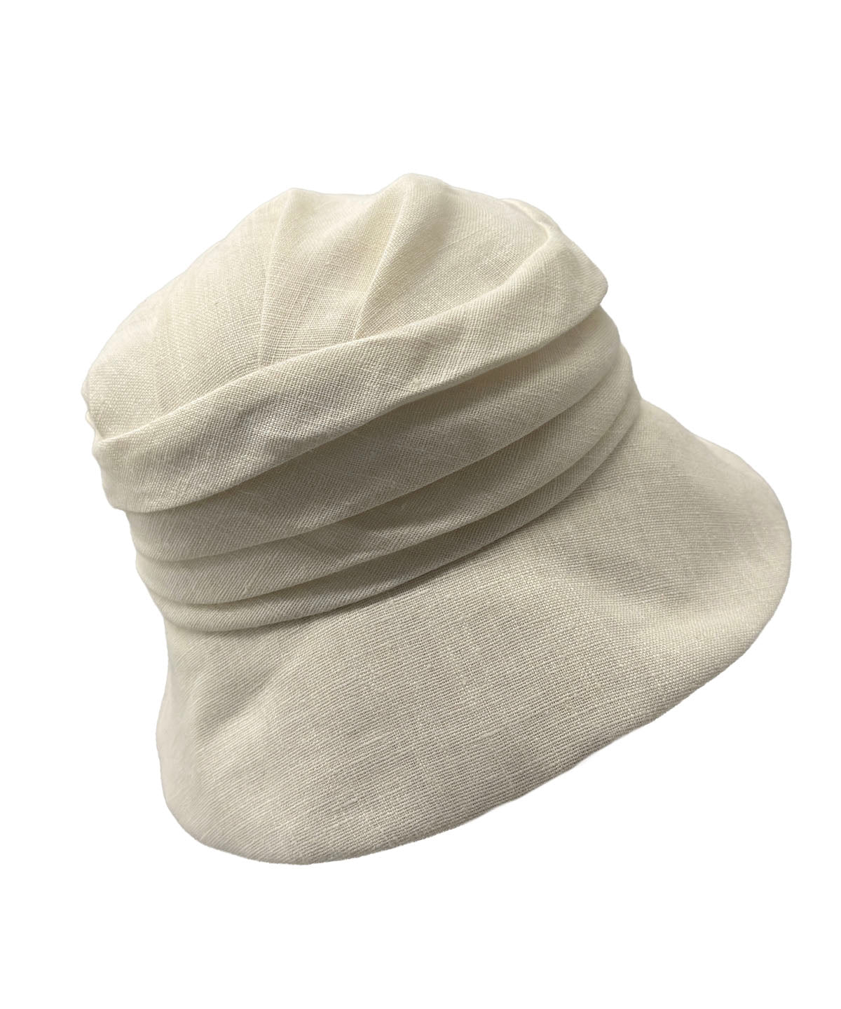Krystyne Bucket Hat Linen in Seashell with ruching detail, shown with brim turned down. Made in Seattle, WA, USA by Pandemonium Seattle.