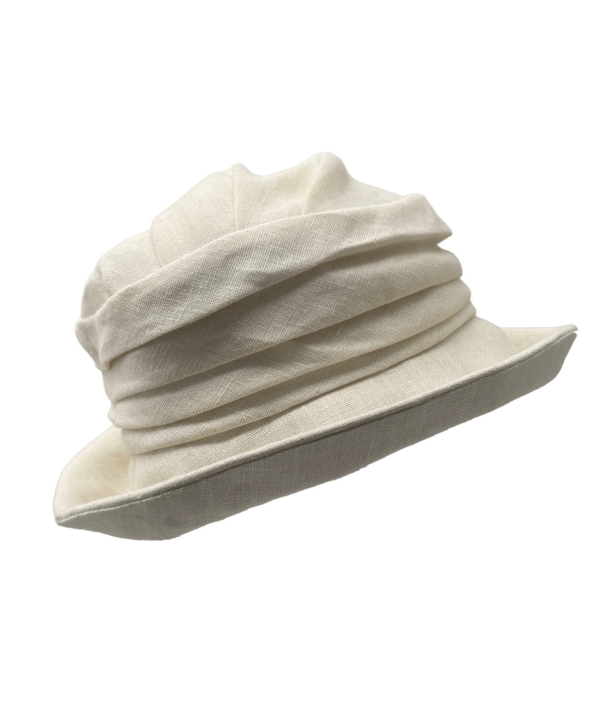 Krystyne Bucket Hat Linen in Seashell with ruching detail, shown with brim turned partially up. Made in Seattle, WA, USA by Pandemonium Seattle.
