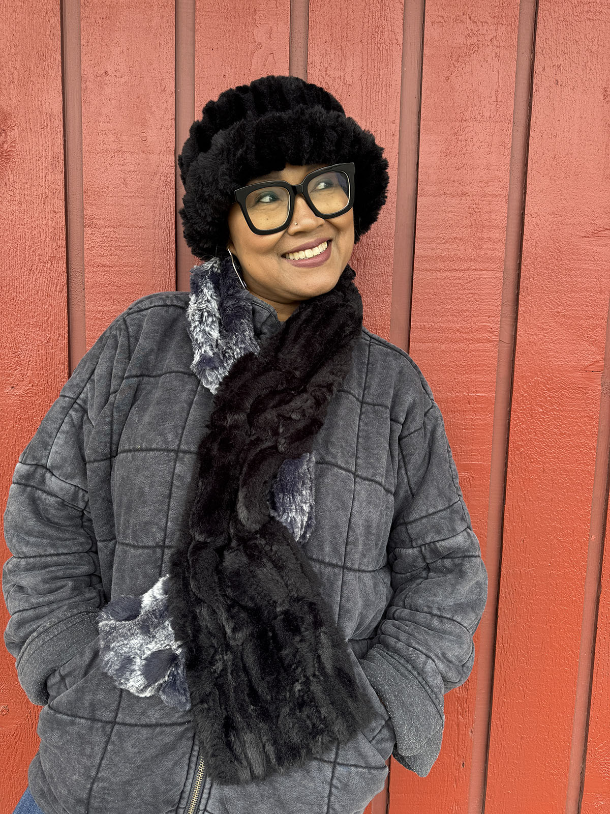 Woman wearing the Double Pull Thru Scarf in Cloudwalk in Shadow with Cirrus in Shadow on the reverse side. Shown with scarf with both pull thrus displayed. Hand sewn in Seattle, WA by Pandemonium Seattle.

