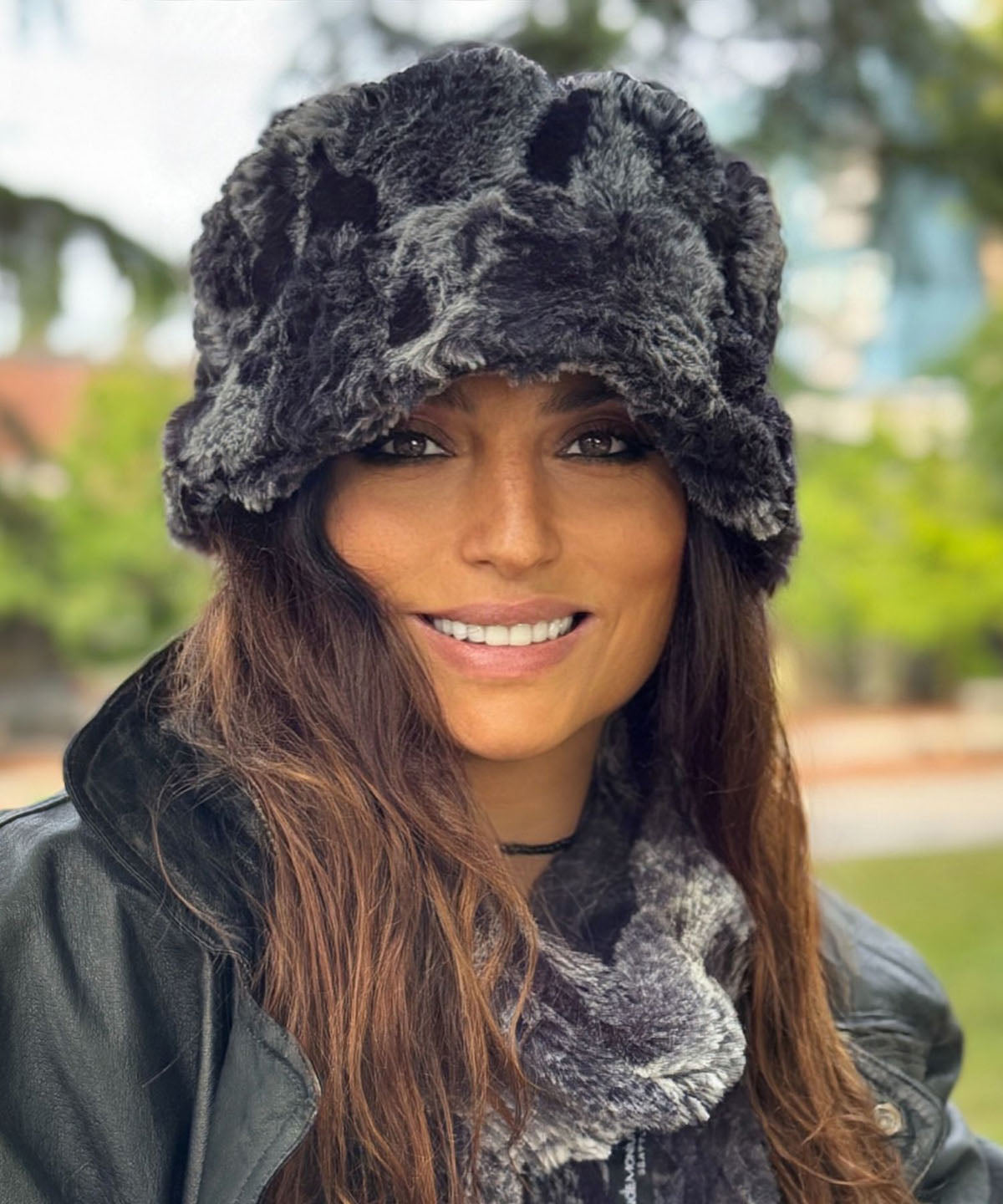 Woman wearing the Molly Hat in Cloudwalk Shadow. Hand sewn in Seattle, Washington by Pandemonium Seattle.
