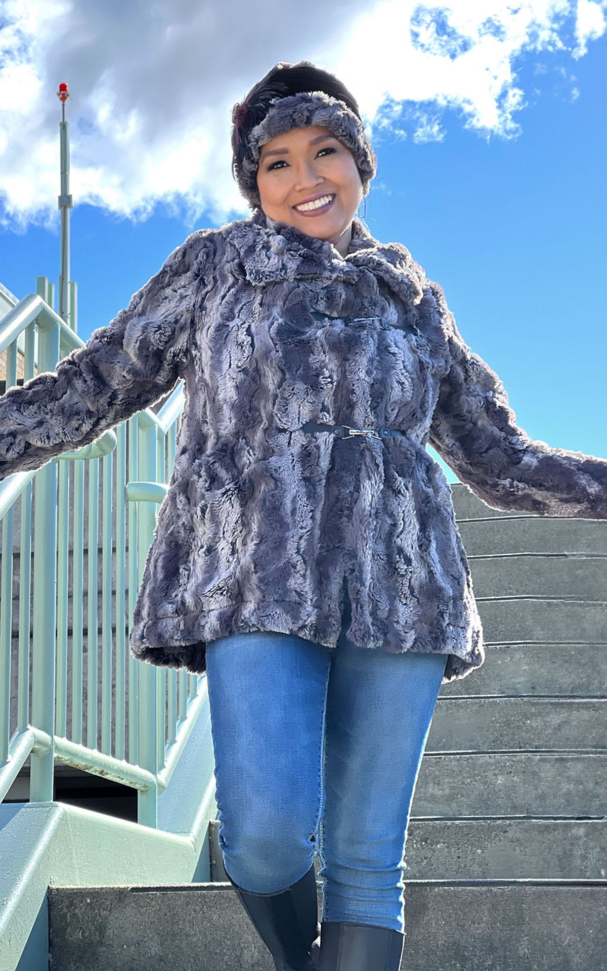 Model walking down stairs wearing a Dietrich Coat in Muddy Waters. Handmade in America by Pandemonium Seattle.
