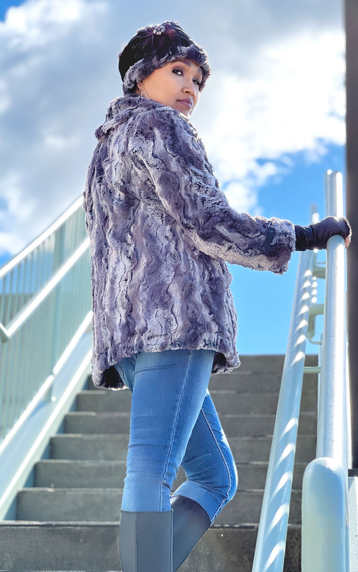 Model walking down stairs wearing a Dietrich Coat in Muddy Waters. Handmade in America by Pandemonium Seattle.