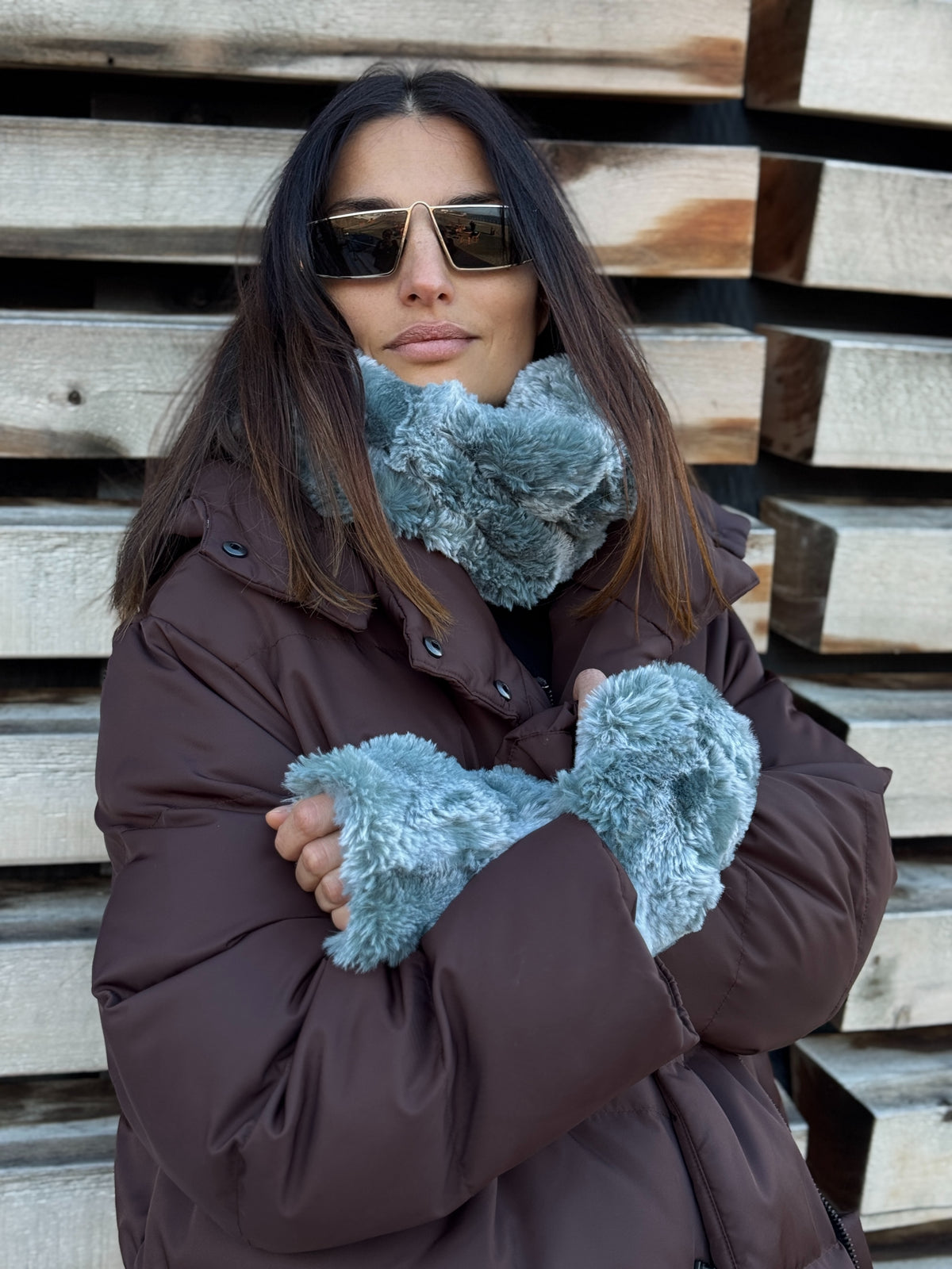 Woman wearing a Neck Warmer in Cloudwalk Blue Mist and matching Fingerless Gloves in Cloudwalk Blue Mist. Handmade in Seattle, WA, USA by Pandemonium Millinery.