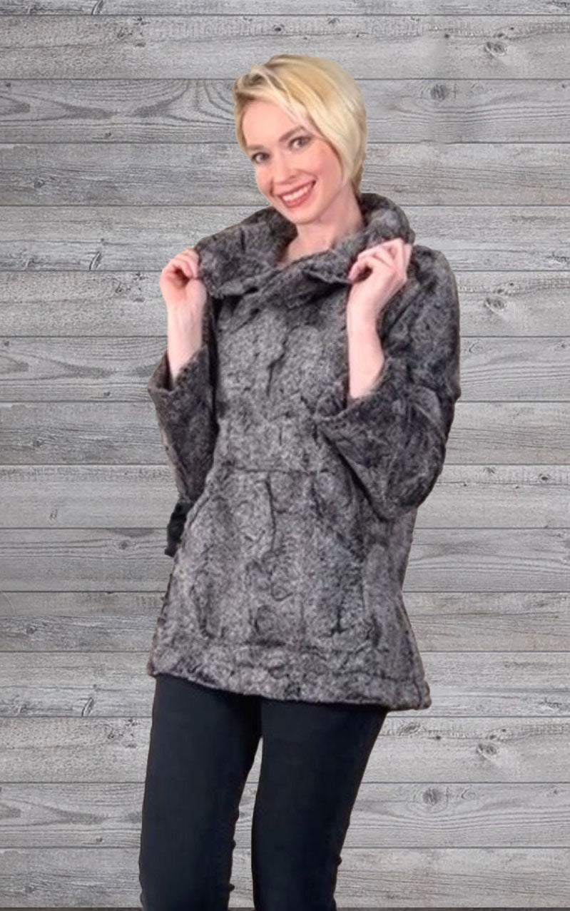 Woman wearing the Pandemonium Hooded Lounger in color Nimbus Grey, with the hood down. Made in Seattle, WA, USA